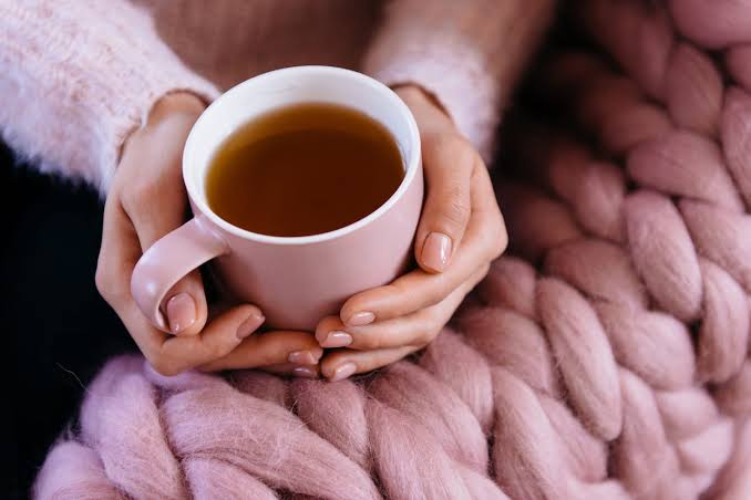 Relaxing warm herbal tea in the evening